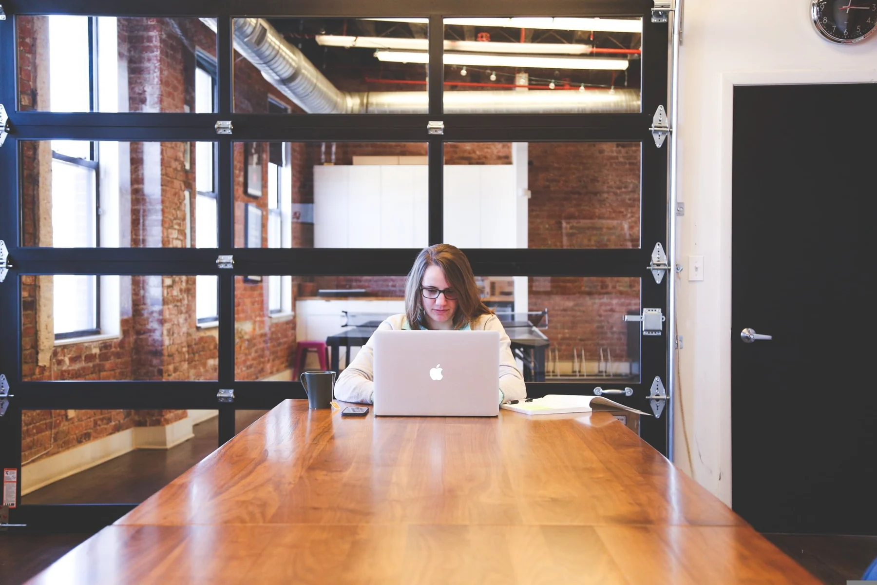 Focused professional working in a spacious studio environment